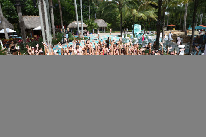 HOLLYWOOD, FLORIDA - MAY 22: (L-R) Duckie Thot, Tanaye White, Brooks Nader, Katie Austin, Josephine Skriver, Camille Kostek, Georgina Burke, Marquita Pring and guests participate in a workout during a Swimsuit on Location event hosted by Sports Illustrated Swimsuit at Hard Rock Seminole on May 22, 2022 in Hollywood, Florida.